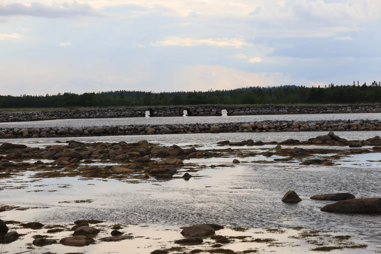 A causeway between Bolshoy Solovetsky and Bolshaya Muksalma Islands. It has three arches for the seawater to flow between the islands.