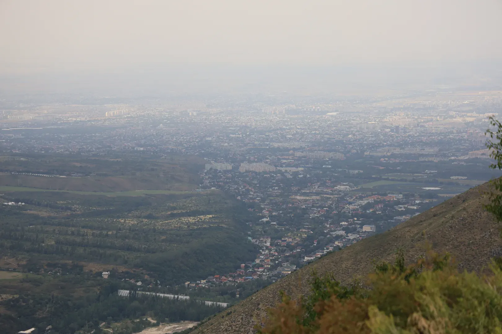 A view of Almaty from the top of the Old Japanese Road.