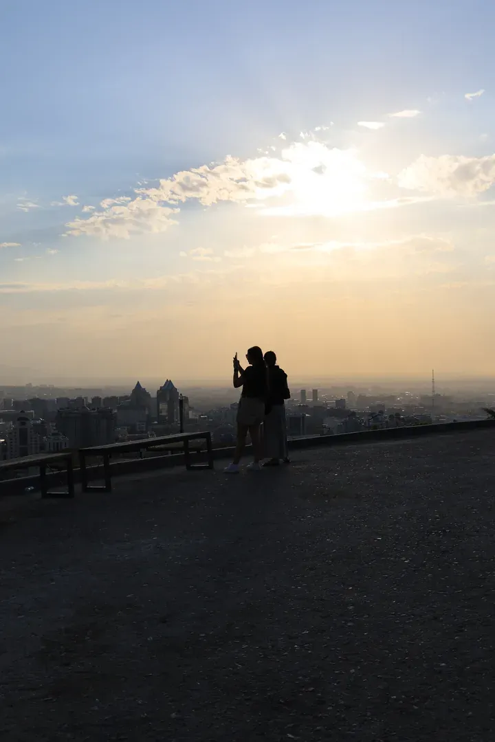 A lot of people climb here every day to take photos of the city and selfies.