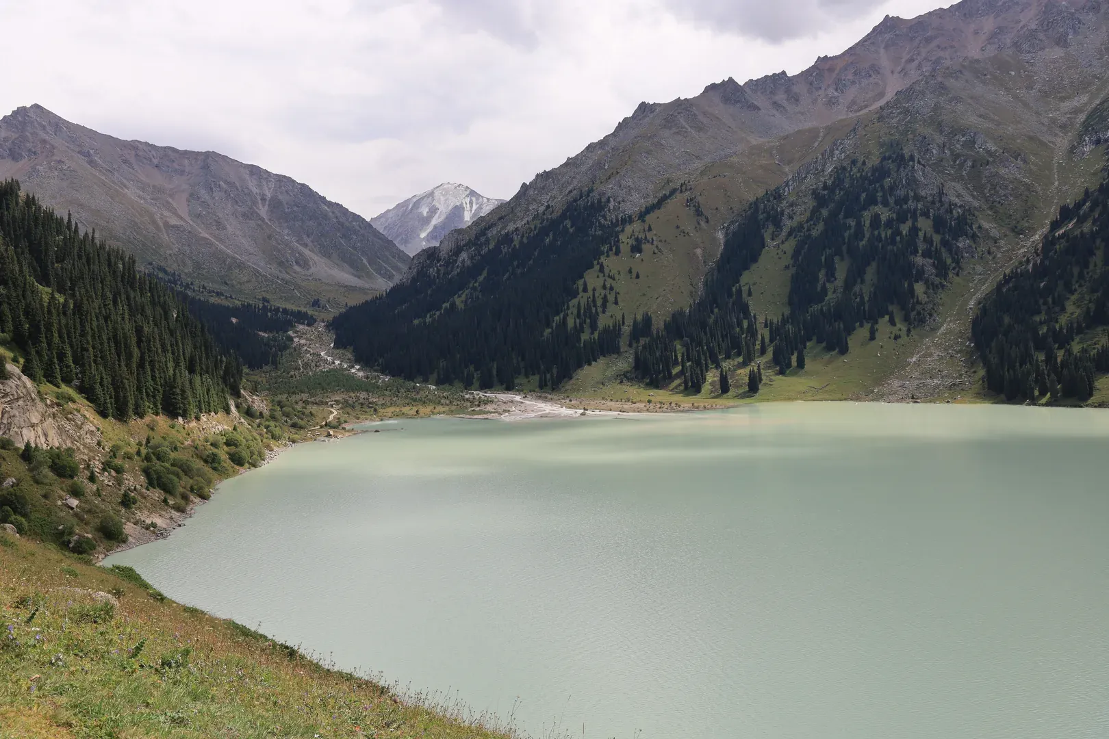 A view of Big Almaty Lake from the eastern trail that continues onwards to other camping sites, as well as to other mountains near the Kyrgyzstan border. The famous Krugosvetka ("round-the-world") trail starts from the eastern gorge near Medeo and finishes here.